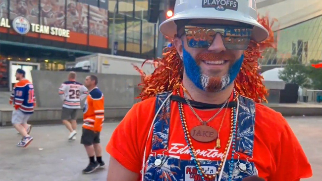 Edmonton Oilers fan paints hundreds of faces per game while taking in the action